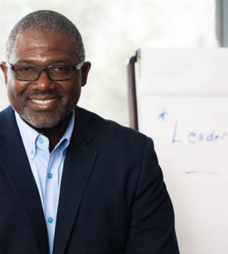 african american businessman giving presentation on leadership