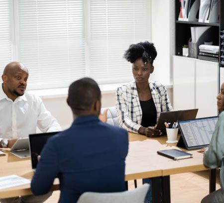 african group corporate business meeting in conference room